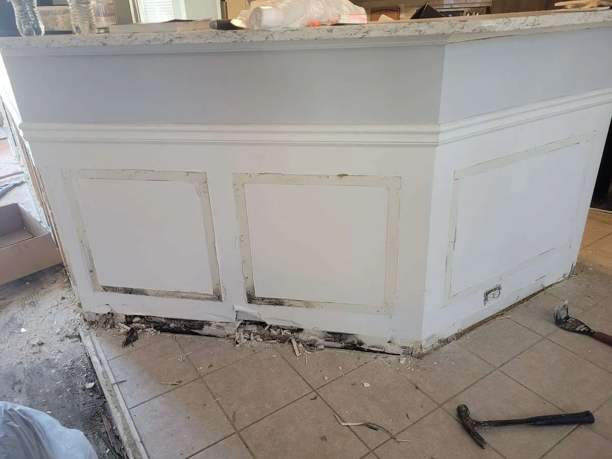 Water damage and mold on kitchen during Storm Damage Restoration in Ash
